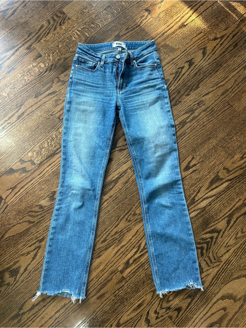 PAIGE Medium Wash Cropped Jeans with Raw Hem